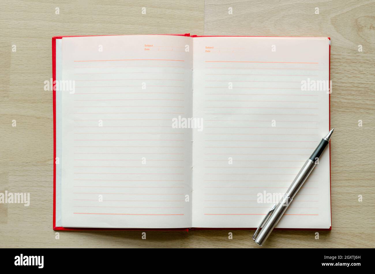 Input Note Book blank notebook with pen on wood table Text input area Stock Photo - Alamy