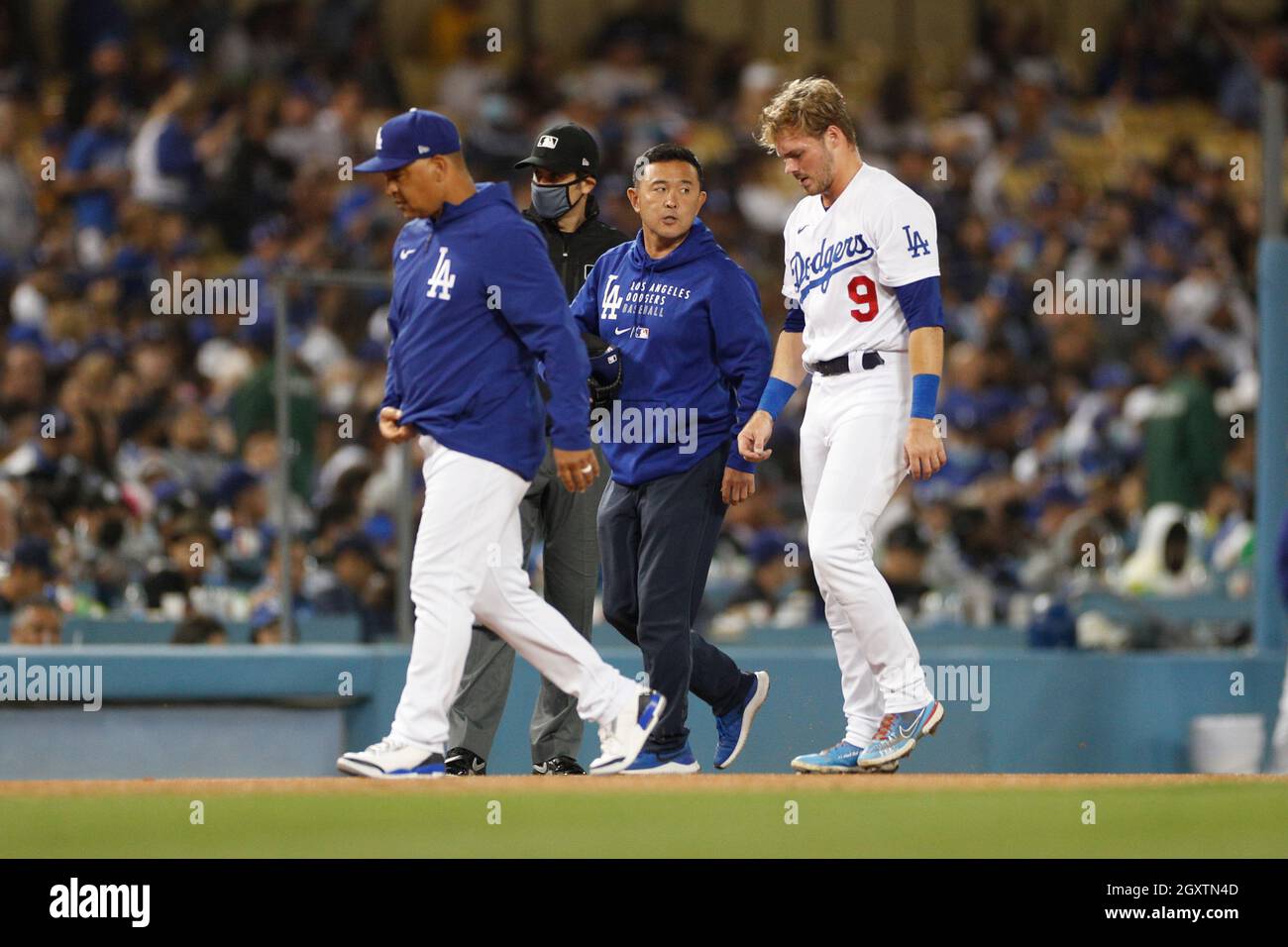 Los Angeles Dodgers center fielder Gavin Lux (9) exits the game with an apparent injury during an MLB regular season game against the San Diego Padres Stock Photo