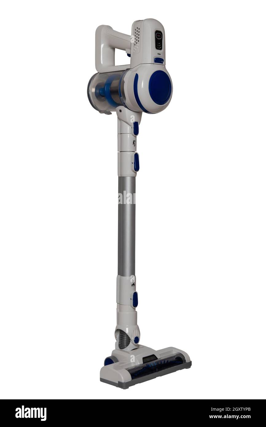 Upright vacuum cleaner. The male hand holds hold a modern cordless