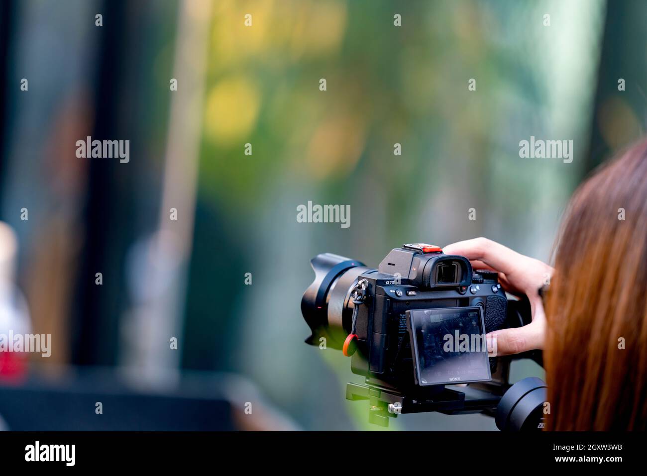 Bangkok,Thailand 2 February 2020: Videoman holding FILMING WITH DJI RONIN M handheld AND SONY A7R mark III. Full-Frame Exmor R BSI CMOS Sensor. Alpha Stock Photo