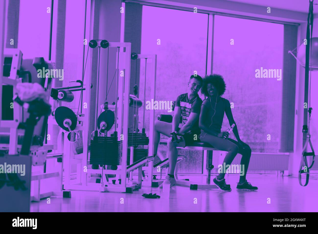 healthy couple have break at crossfit gym african american woman with ...