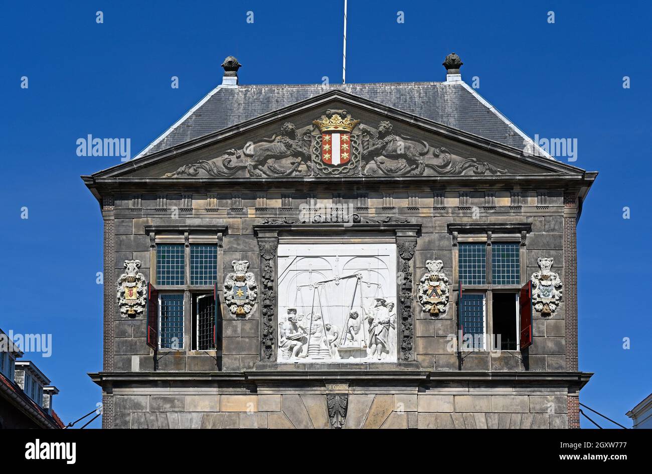gouda  / netherlands - 2021-09-05: historical weigh house with relief depicting cheese weighing and trade --  --  [credit: joachim affeldt - larger fo Stock Photo
