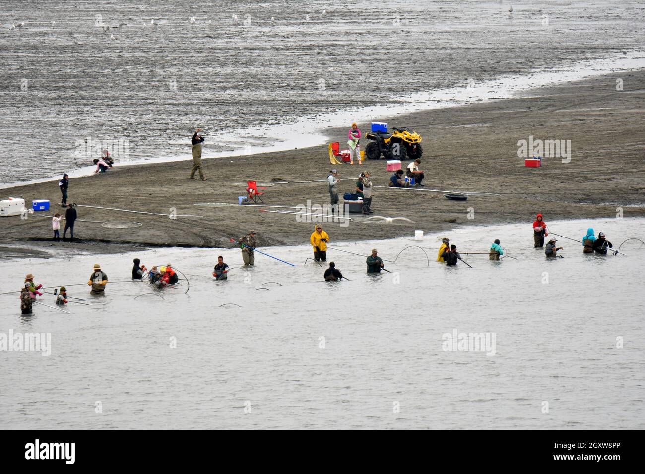 Popular recreational fishing during the salmon run season at the Kenai River mouth, Kenai