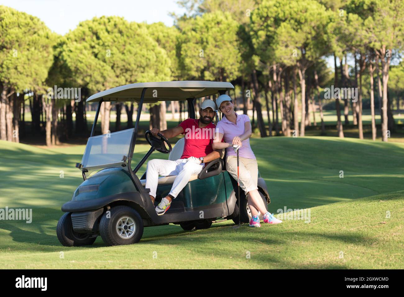 Family on golf buggy hi-res stock photography and images - Alamy