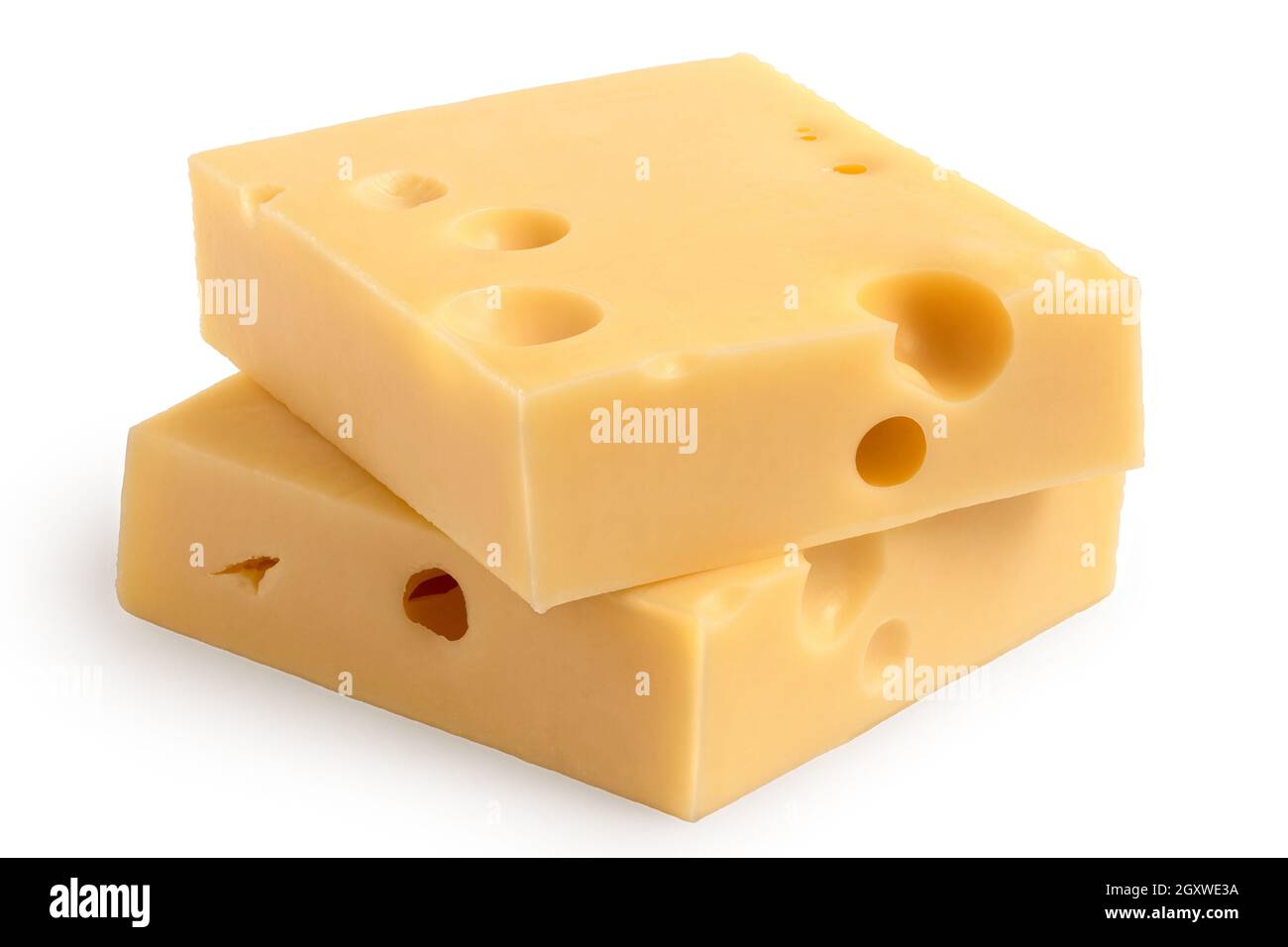 Two blocks of emmental cheese on top of each other isolated on