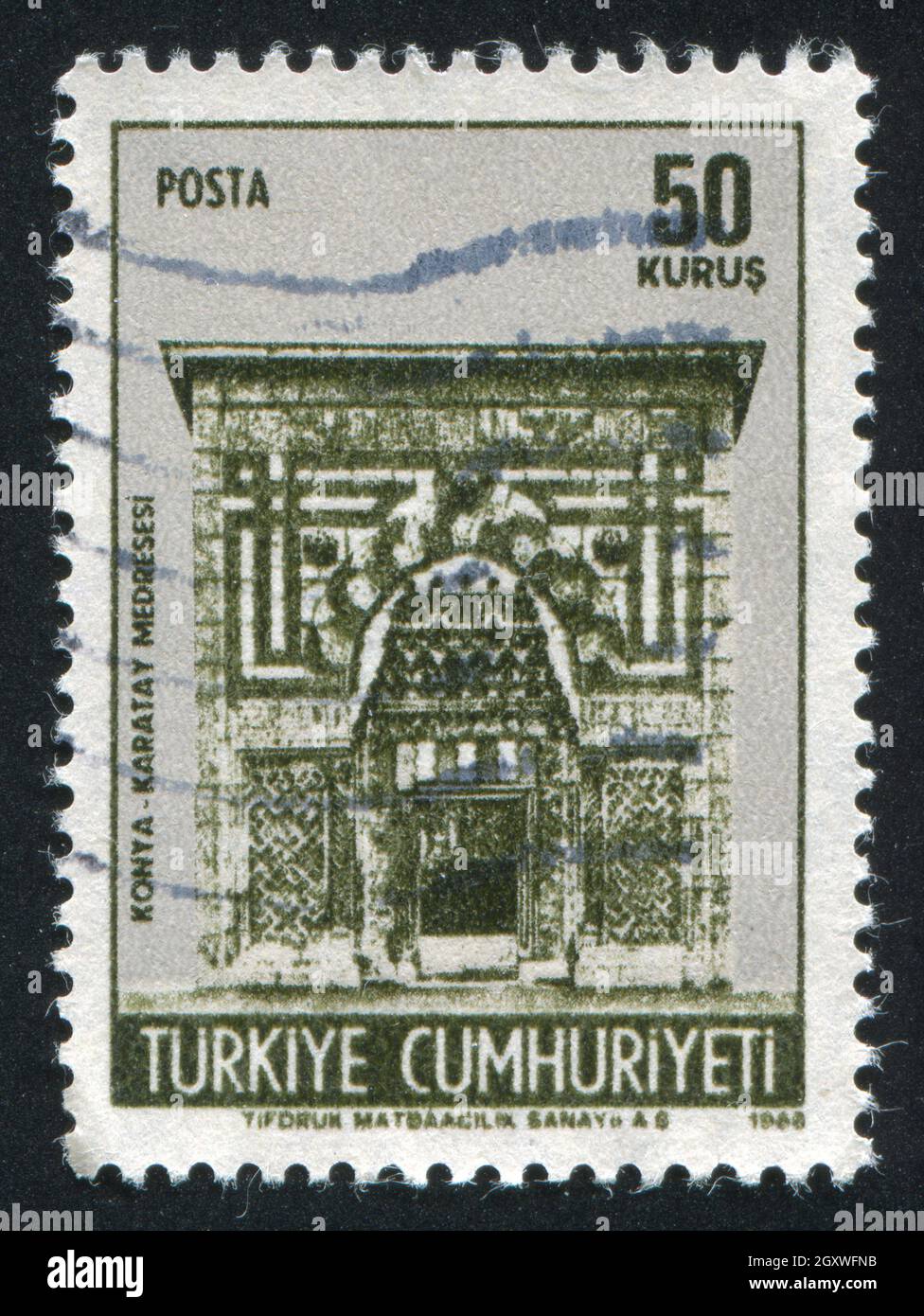 TURKEY - CIRCA 1968: stamp printed by Turkey, shows Karatay Medresse, University Gate, Konya, circa 1968 Stock Photo