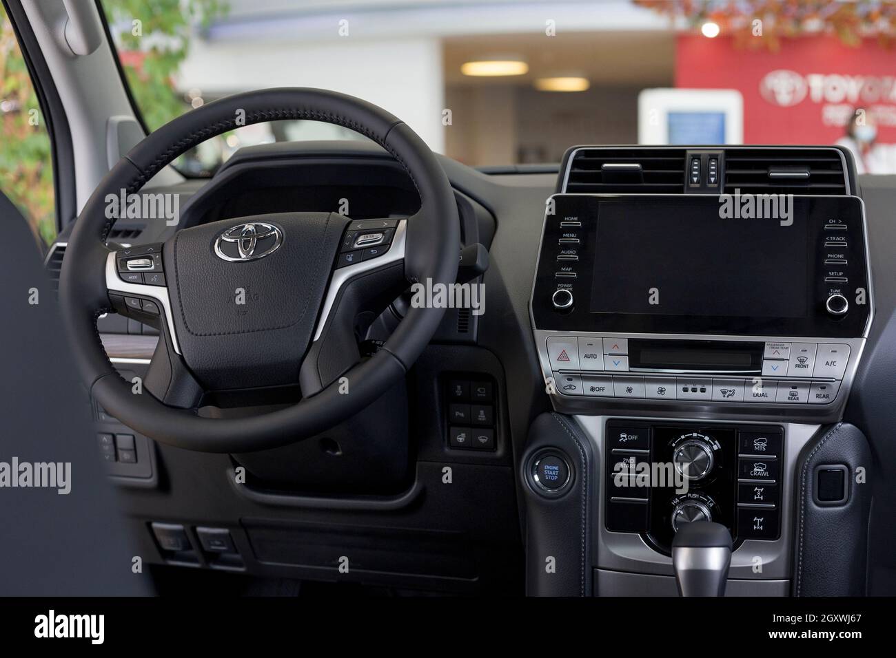 Russia, Izhevsk - September 30, 2021: Toyota showroom. Interior of new modern Land Cruiser Prado car in dealer showroom. Modern transportation. Stock Photo