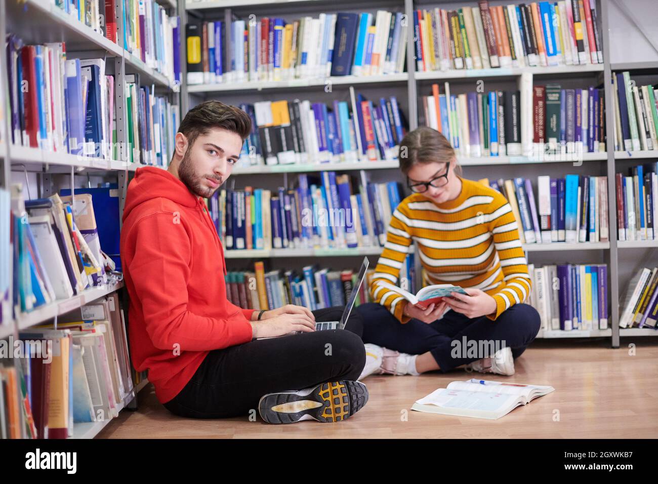 Student librarian talking hi-res stock photography and images - Alamy