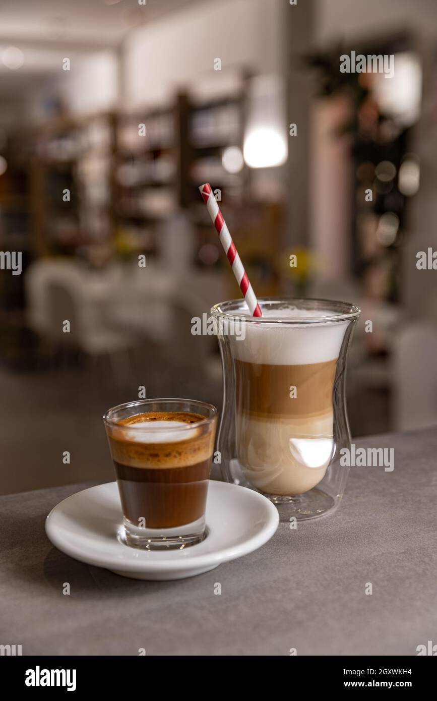 https://c8.alamy.com/comp/2GXWKH4/layered-cappuccino-and-long-espresso-coffee-morning-hot-beverage-close-up-shot-2GXWKH4.jpg