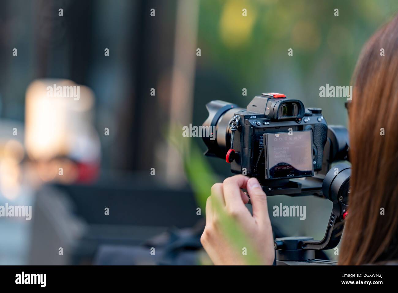 Bangkok,Thailand 2 February 2020: Videoman holding FILMING WITH DJI RONIN M handheld AND SONY A7R mark III. Full-Frame Exmor R BSI CMOS Sensor. Alpha Stock Photo
