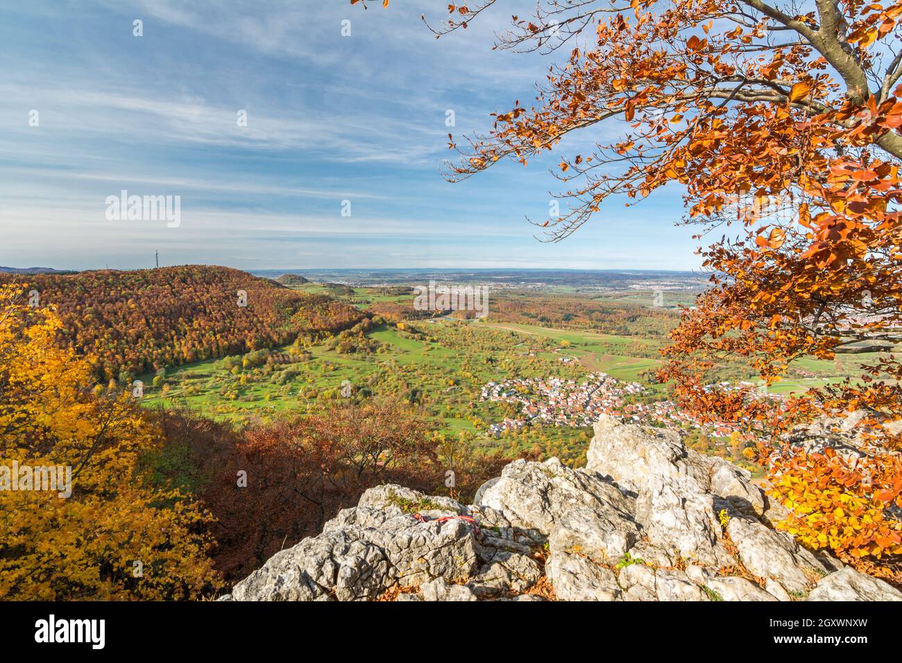 View from a cliff ledge over beautiful autumn landscape in the Swabian Alps in Southern Germany Stock Photo