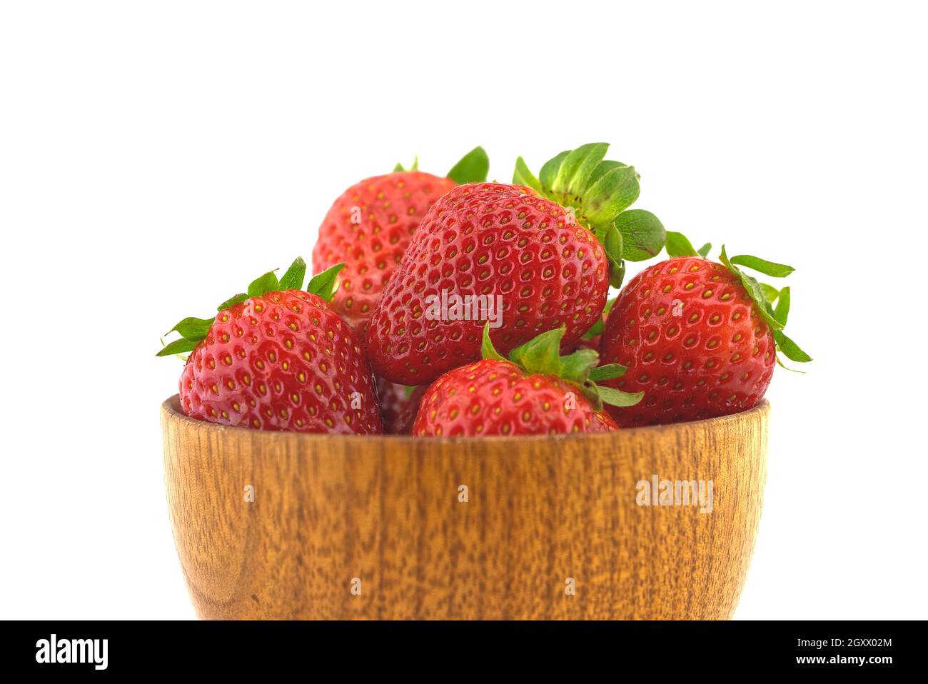 Garden strawberries in wooden bowl isolated on white background Stock ...
