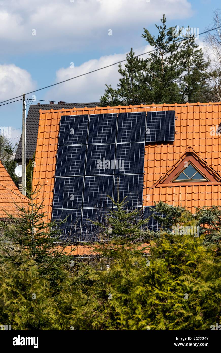 Solar electric panels on a house roof Stock Photo Alamy