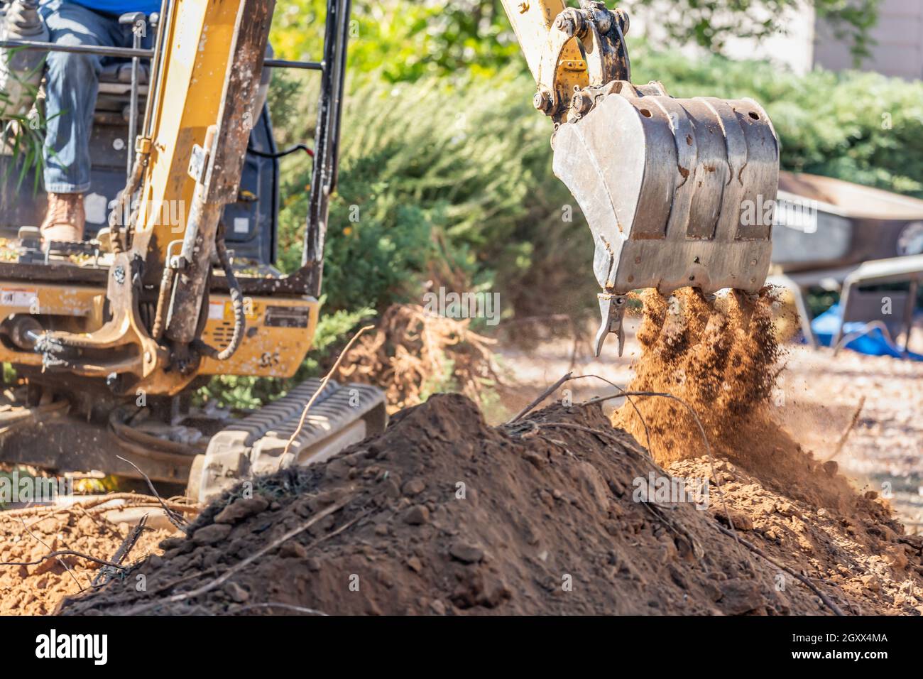Working Excavator Tractor Digging A Trench At Construction Site Stock ...