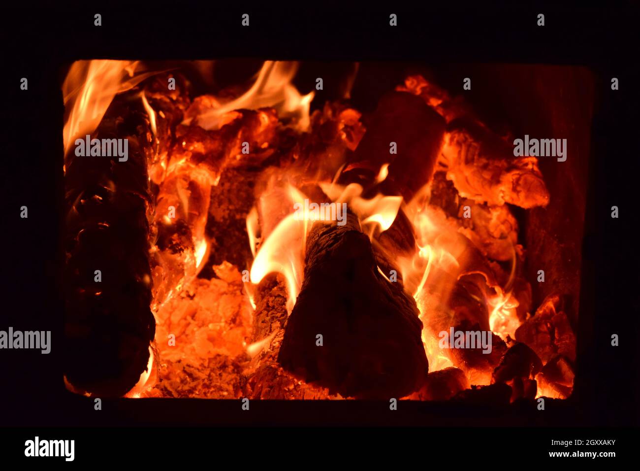 Hot coals in the stove. Red burned by heating the particles tree Stock