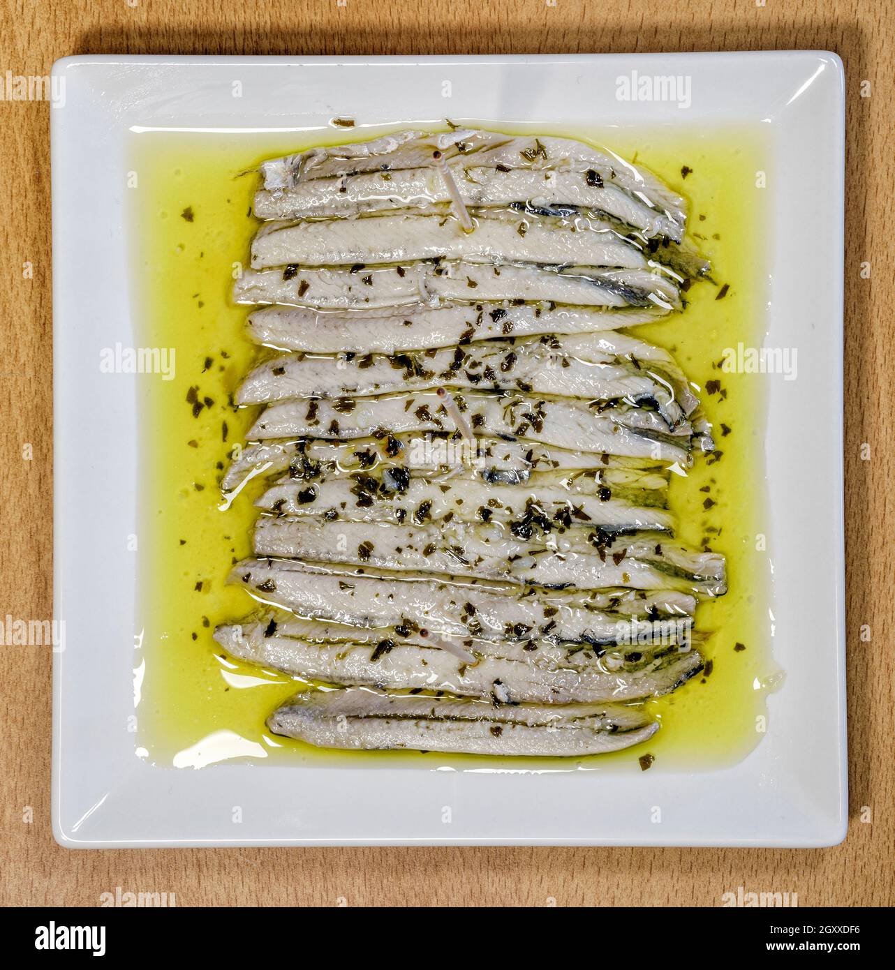 a pile of anchovies in vinegar in oil, ration type tapa typical of