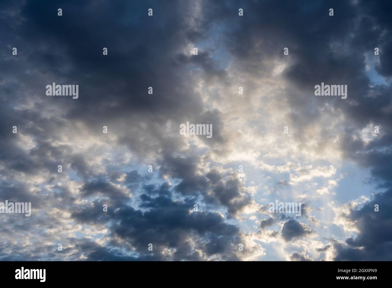 Beautiful clouds of different shapes in the sky before sunset Stock ...