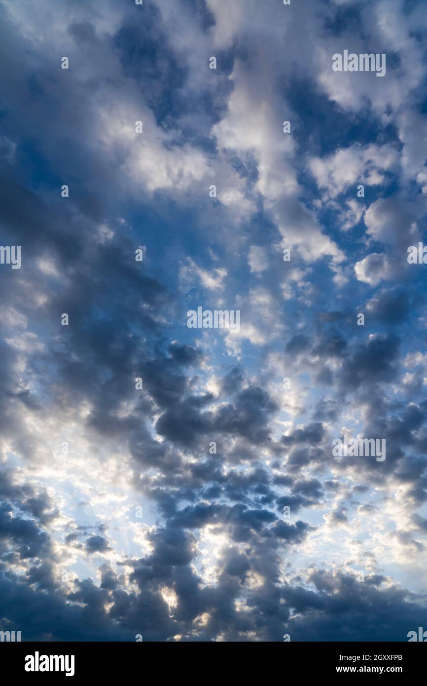 Beautiful clouds of different shapes in the sky before sunset Stock ...