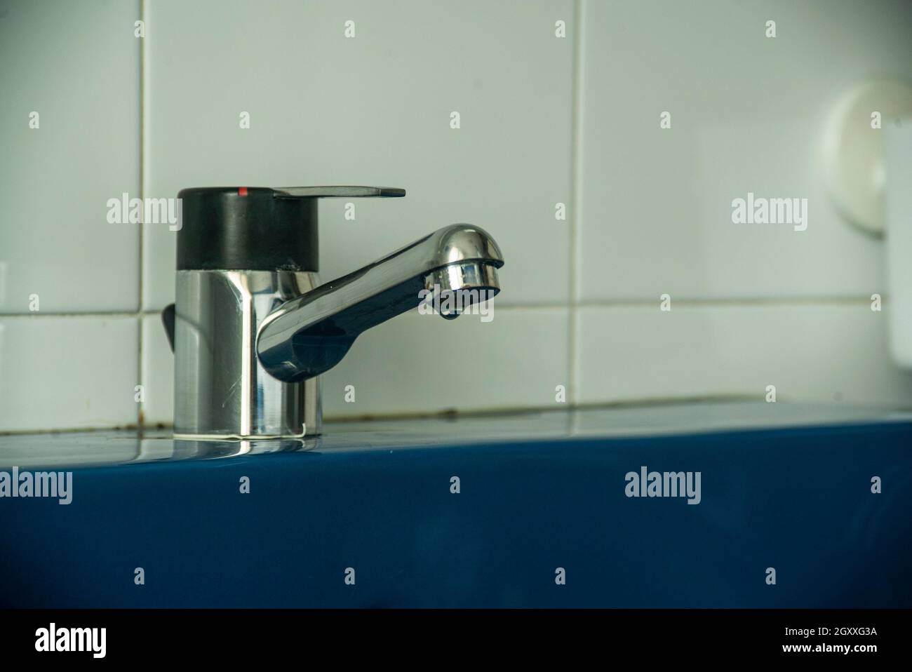 Faucet dripping detail in the bathroom sink Stock Photo Alamy