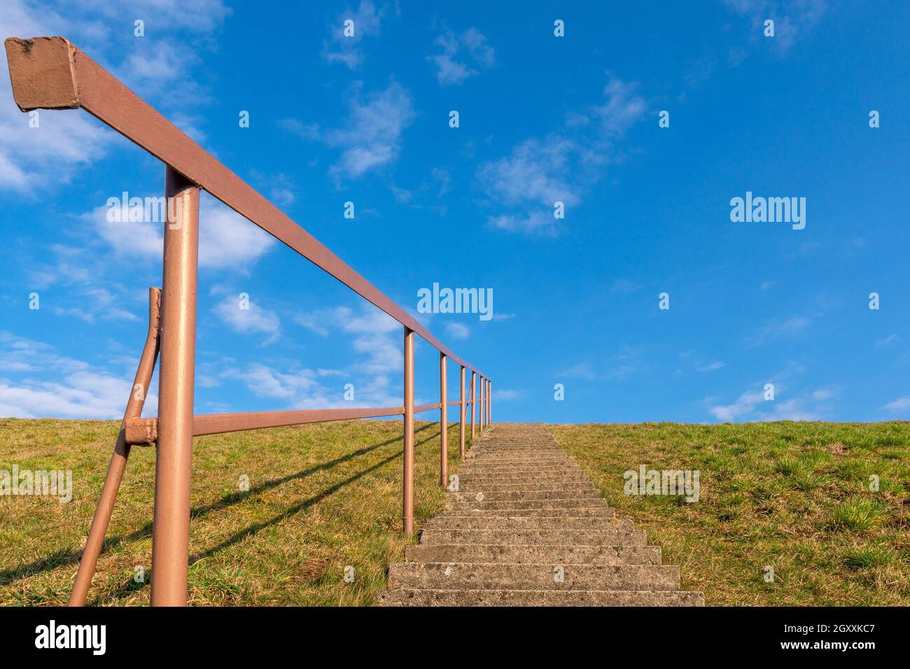Concrete staircase against blue sky. Development motivation career growth concept Stock Photo