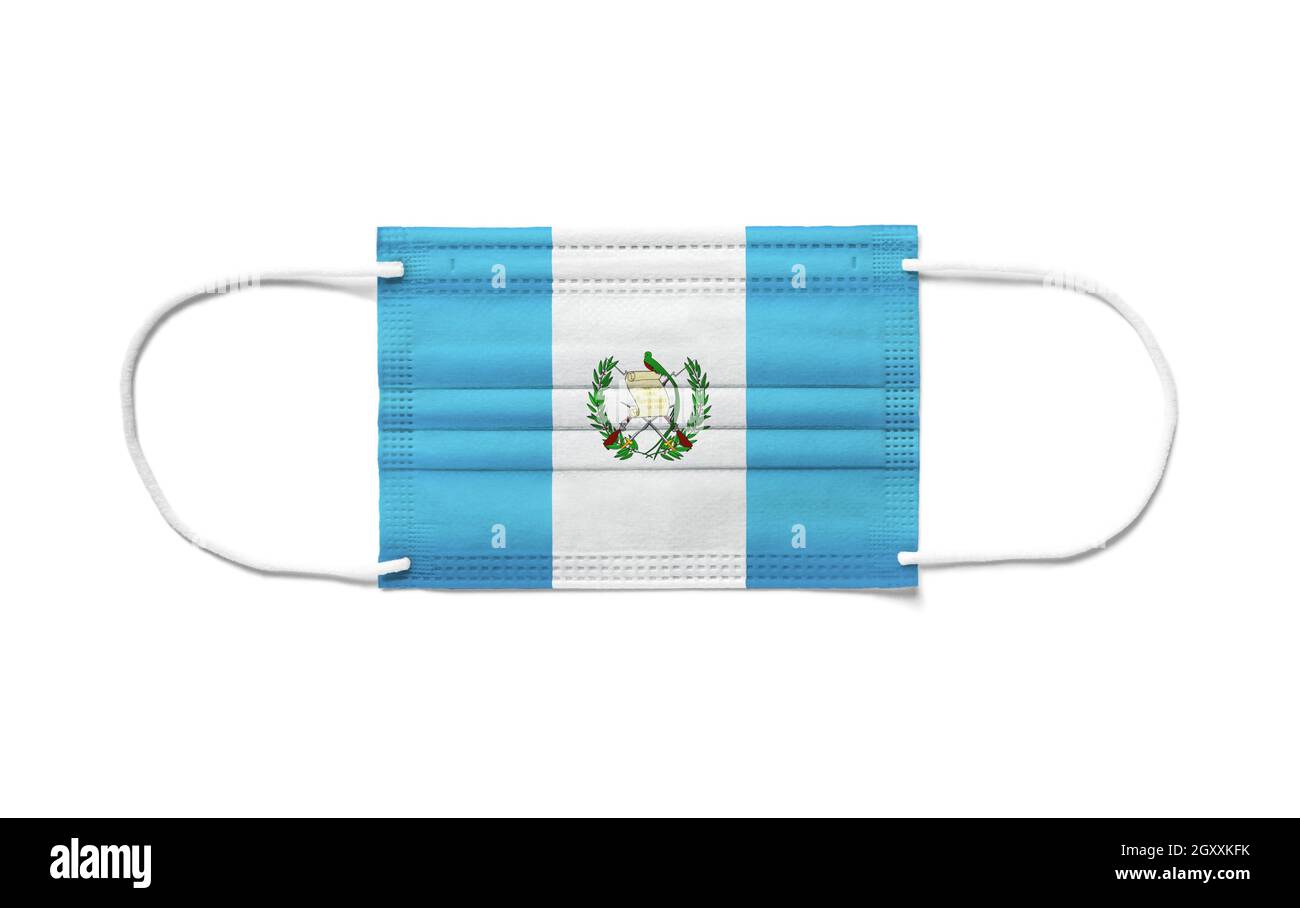 Flag of Guatemala on a disposable surgical mask. White background isolated Stock Photo