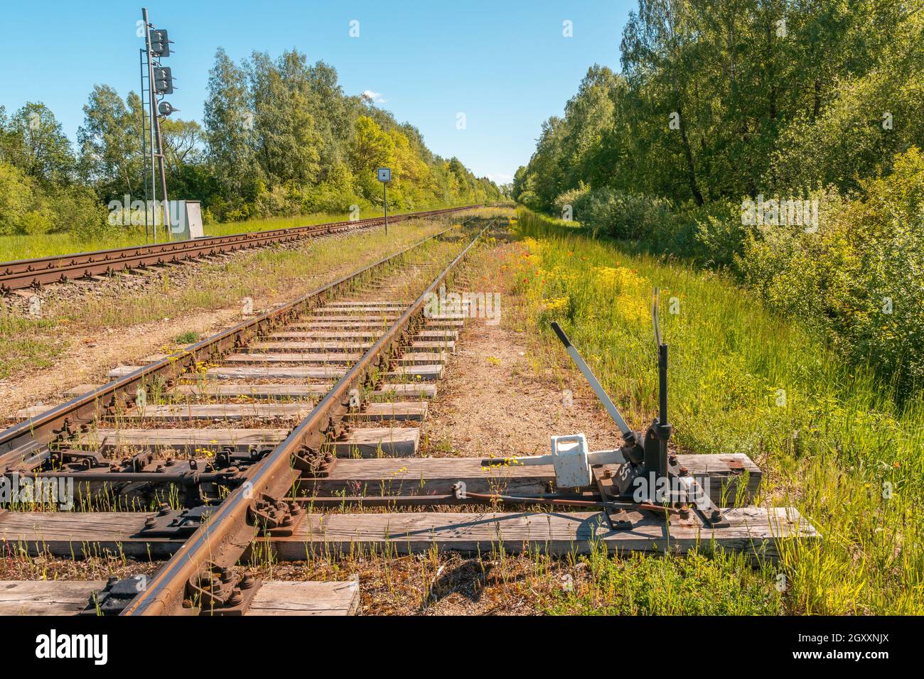 Railway Track with railroad switch mechanism for changing the line Stock Photo Alamy