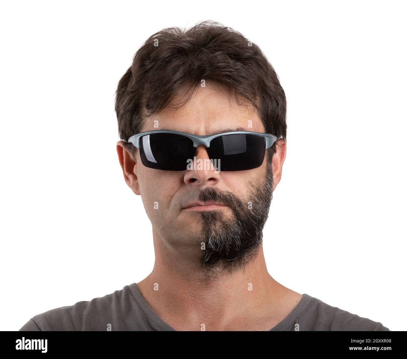 split personality - portrait of ordinary forty - 40 years old bearded man with half shaved and unshaven face with sunglasses isolated on white Stock Photo