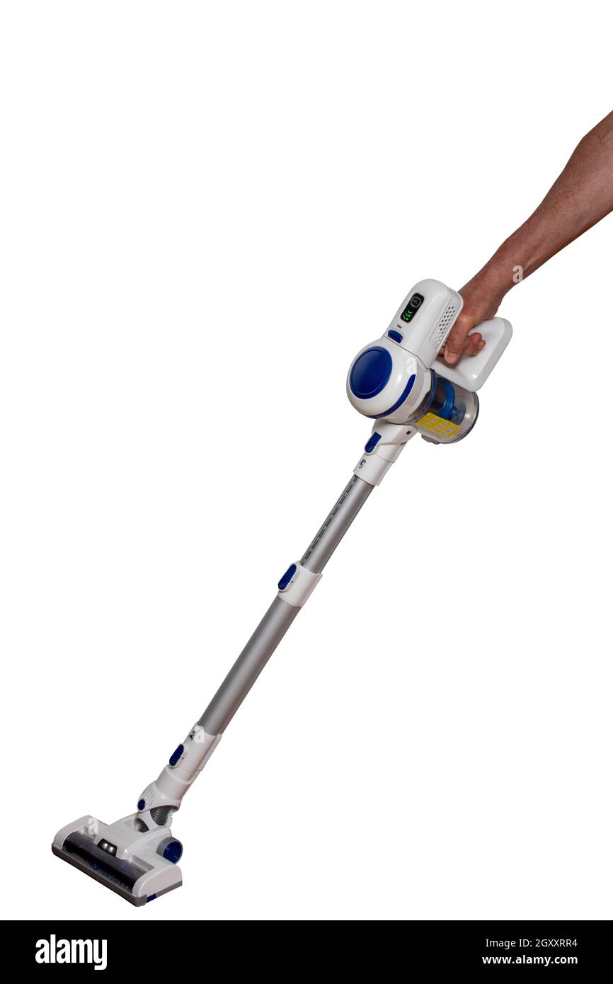 Vacuum cleaner isolated. The male hand holds hold a modern cordless