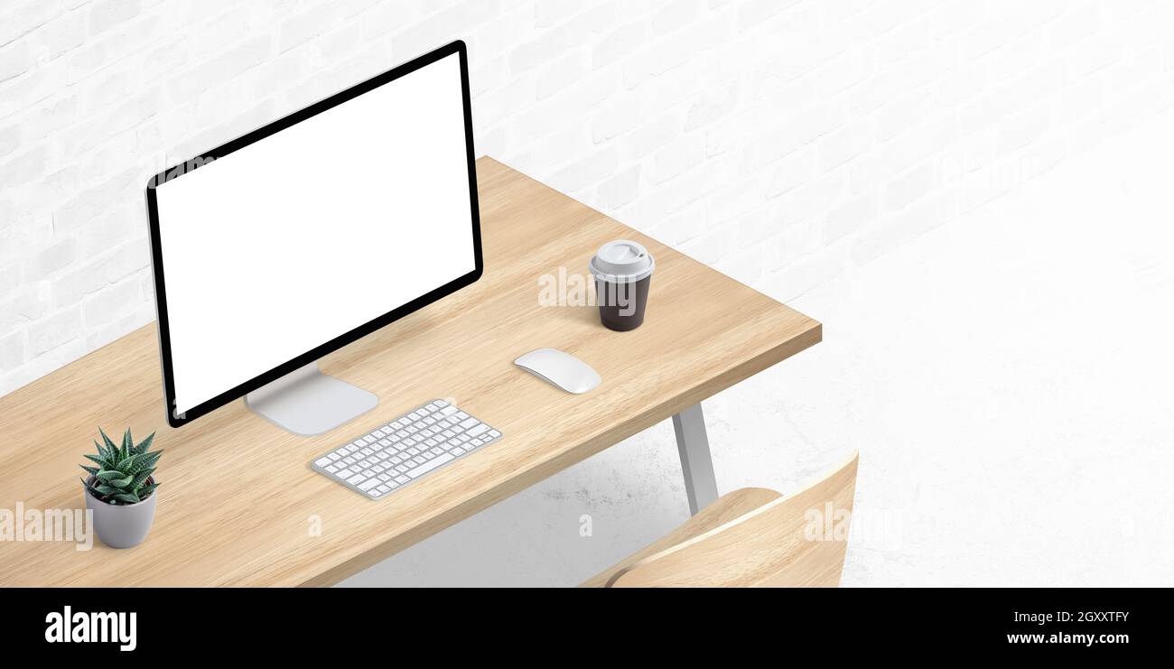 Computer display mockup on office desk in isometric position. Copy space beside Stock Photo