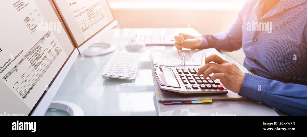 Bookkeeper Accountant Calculating Tax Invoice On Office Computer Stock ...