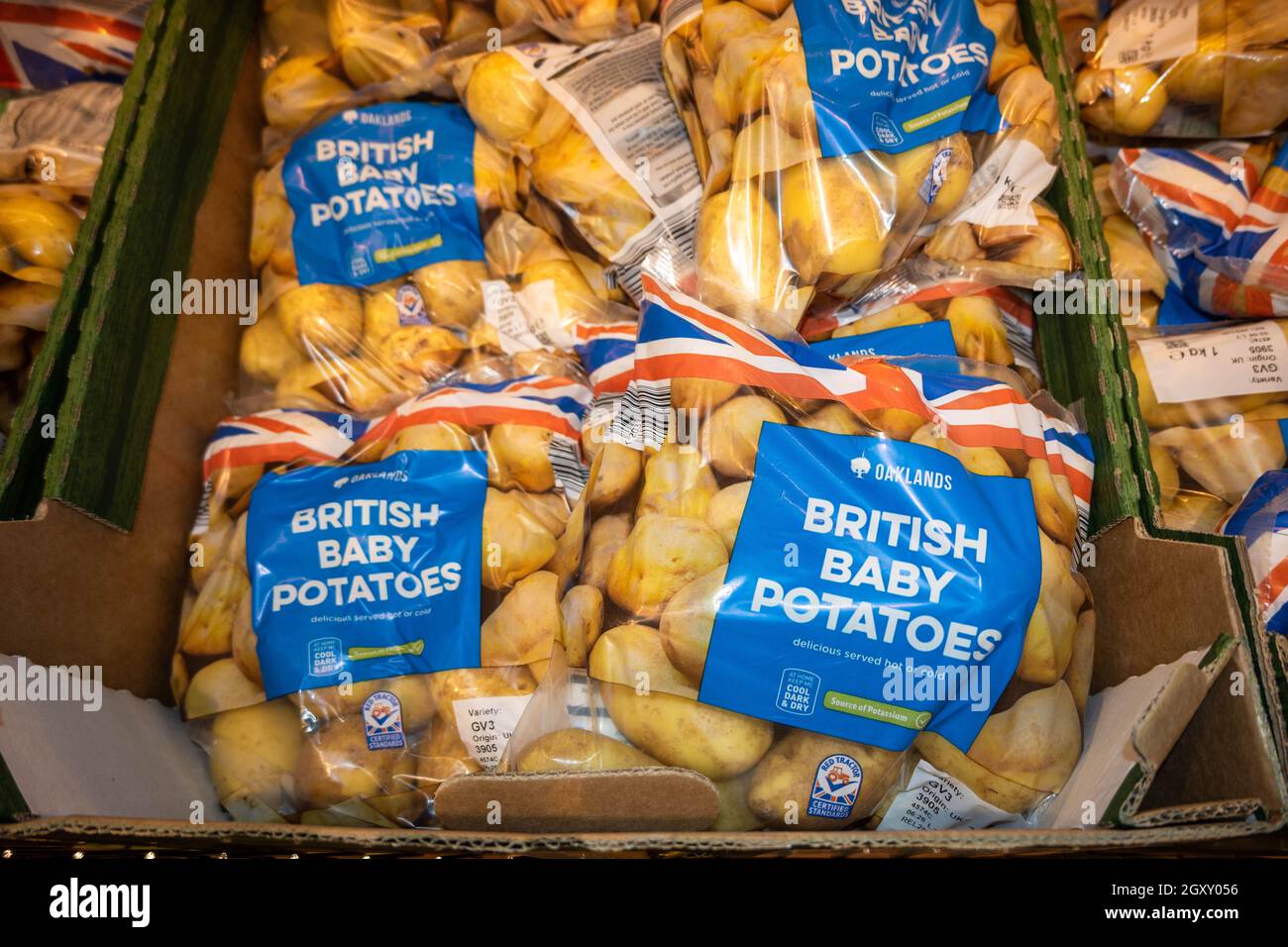 A view of potatoes in plastic bags in a supermaket in England Stock