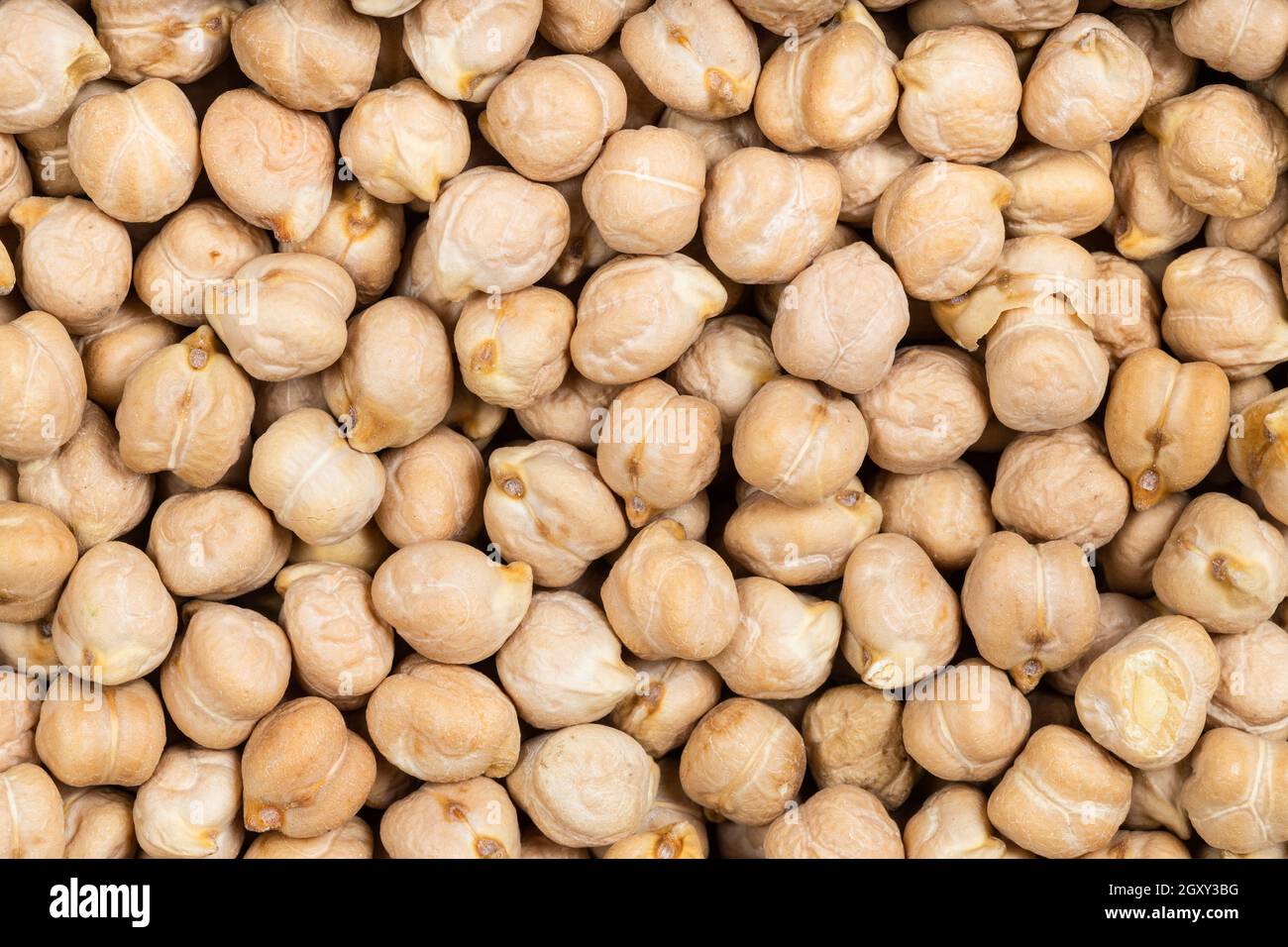 food background - raw dried chickpea seeds Stock Photo - Alamy