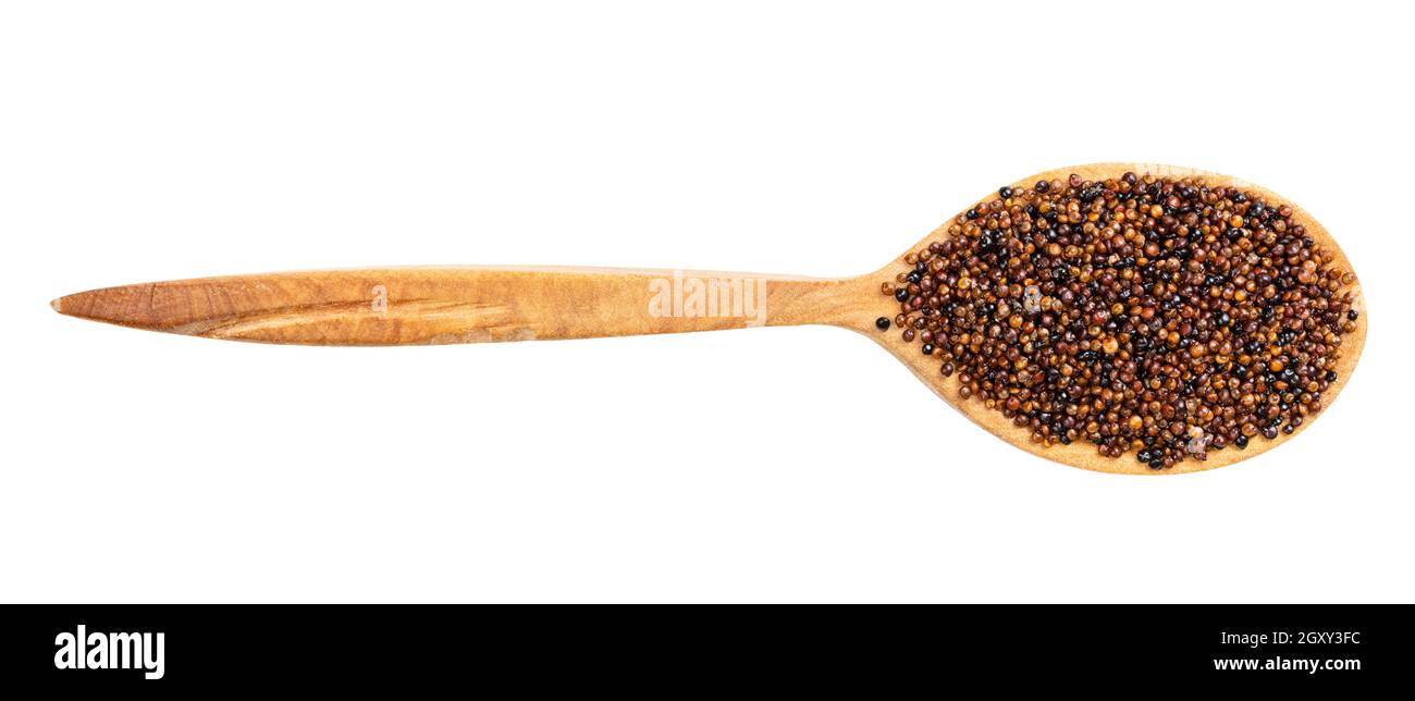 top view of wood spoon with canihua grains isolated on white background Stock Photo