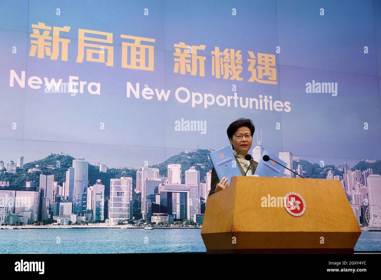 (211006) -- HONG KONG, Oct. 6, 2021 (Xinhua) -- Chief Executive of China's Hong Kong Special Administrative Region (HKSAR) Carrie Lam speaks during a press conference in Hong Kong, south China, Oct. 5, 2021. Carrie Lam unveiled Wednesday an array of new measures to reinforce Hong Kong's status as a global financial hub, including improving the listing regime of the stock market and facilitating the cross-boundary flow of renminbi. The 2021 policy address, the fifth of its kind since Lam took office in 2017, focuses on bolstering Hong Kong's economy, tackling an entrenched housing shortage a Stock Photo