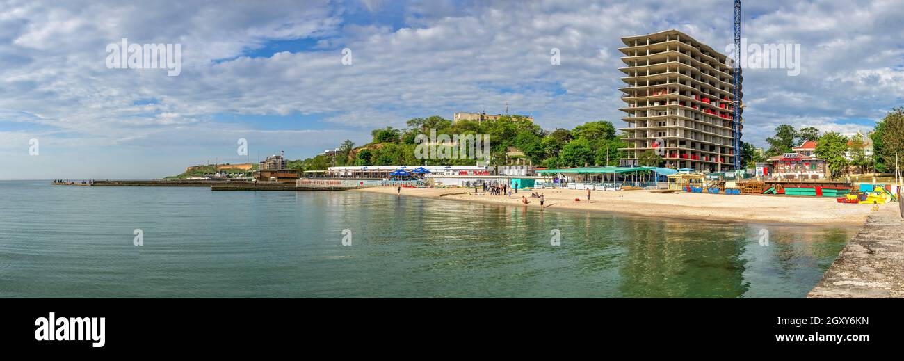 01.06.2021. Illegal construction of a residential building on the public beach Zolotoy Bereg in Odessa, Ukraine, on a sunny summer morning Stock Photo