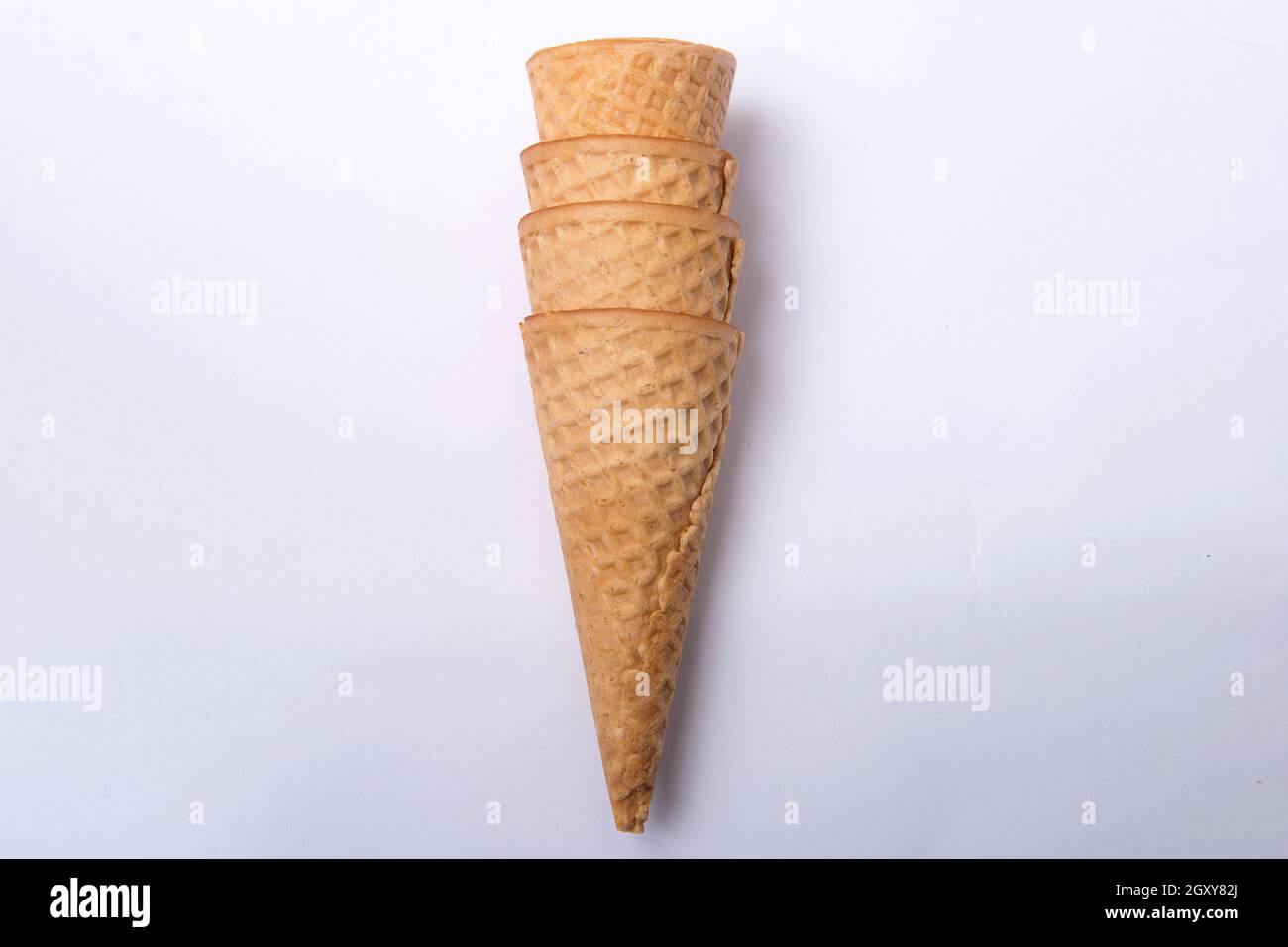 Ice cream cone isolated on white background Stock Photo - Alamy