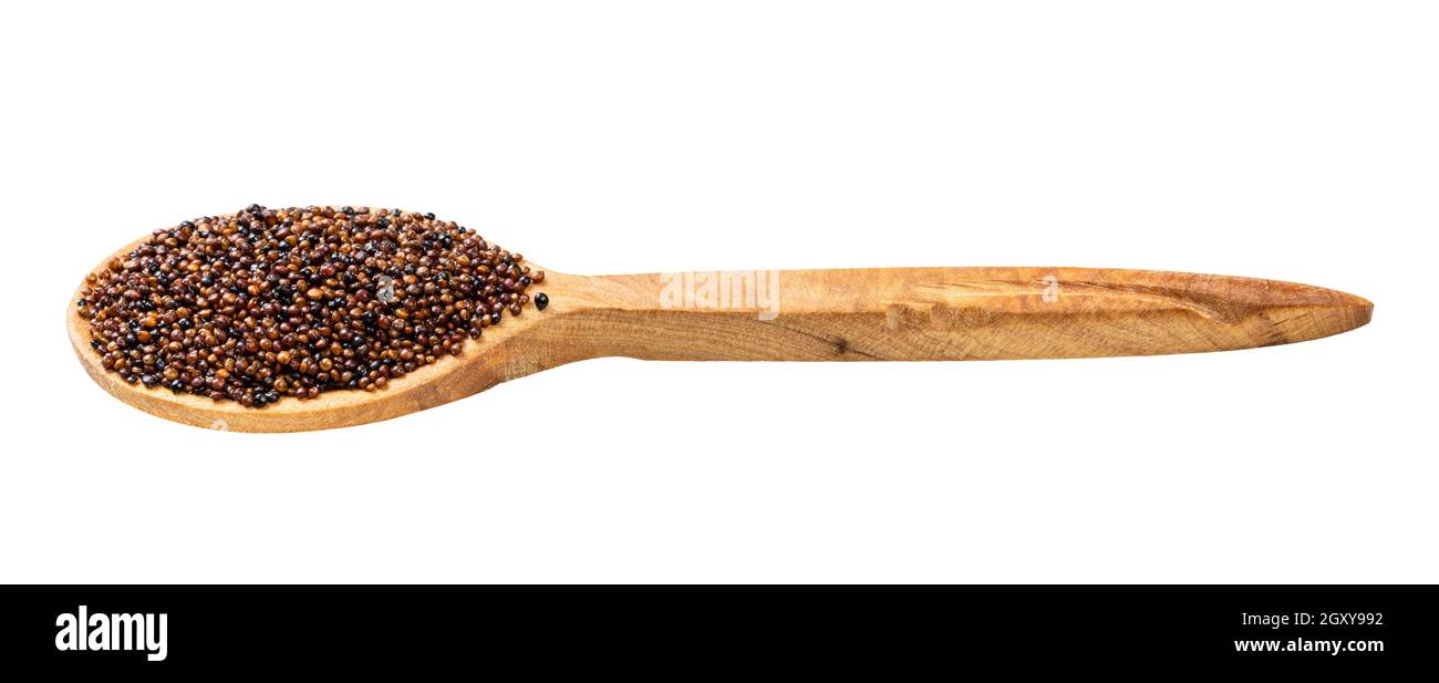 wooden spoon with canihua grains isolated on white background Stock Photo