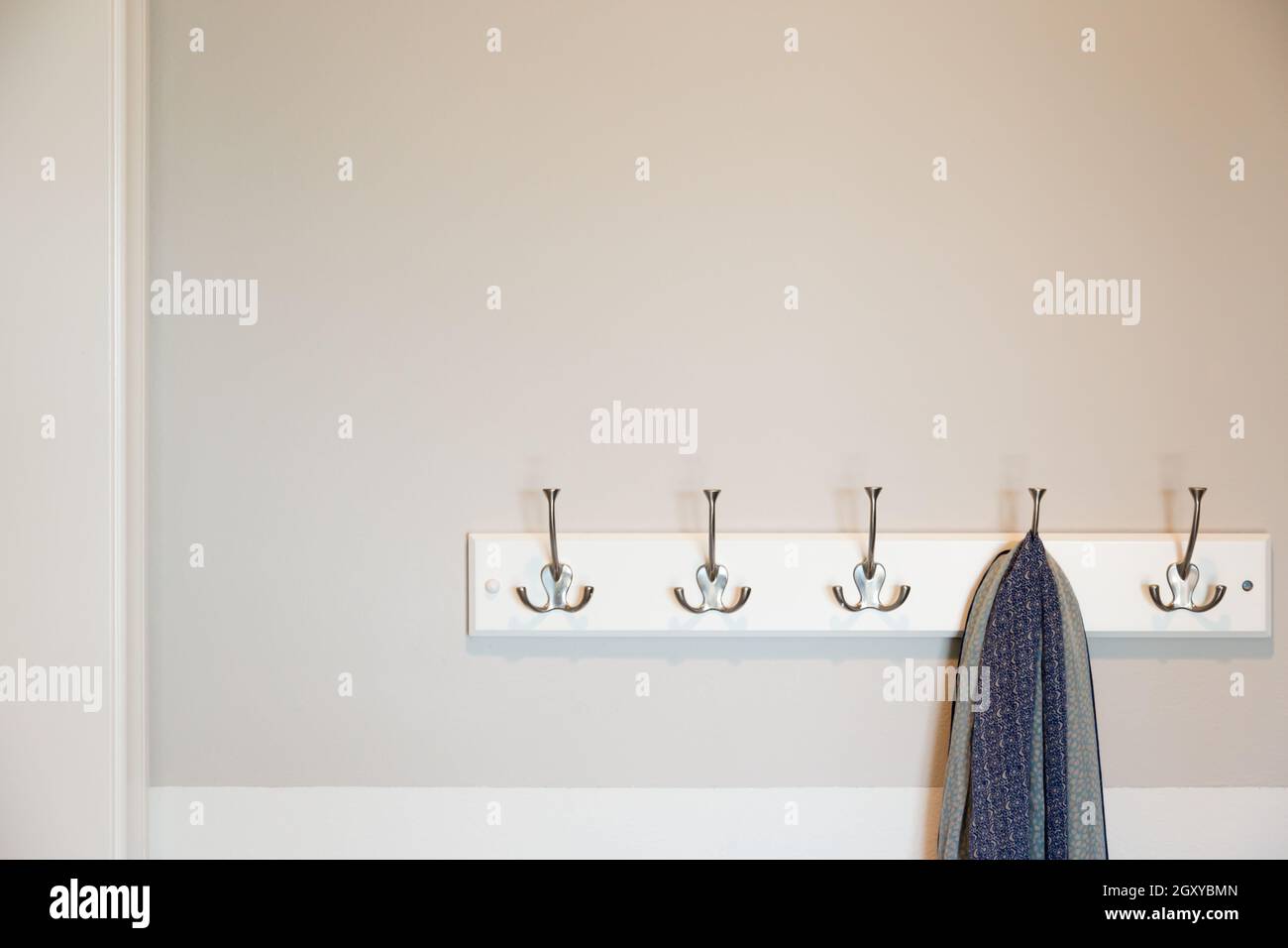 Wall in House with Scarf Hanging on Coat Rack Hooks Abstract Stock ...