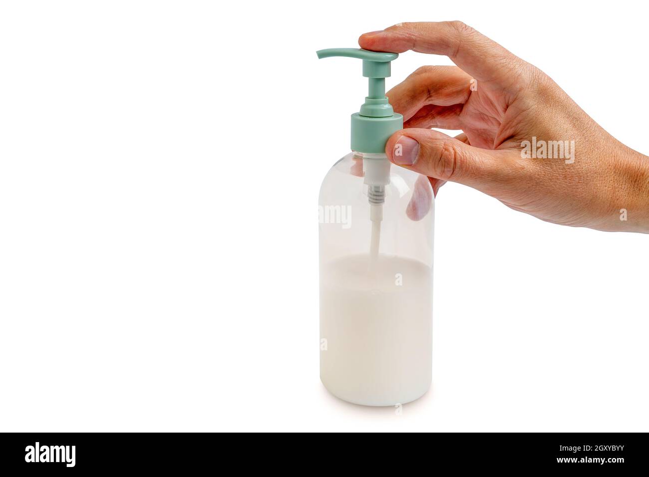 Hand using hand sanitizer gel pump dispenser. Copy space Stock Photo ...