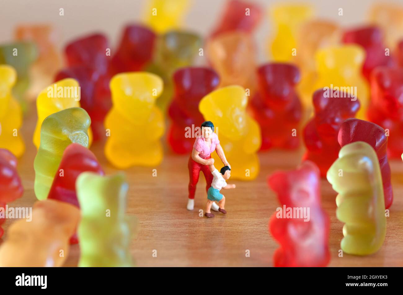 Gummy bear invasion. Harmful/ junk food concept Stock Photo Alamy