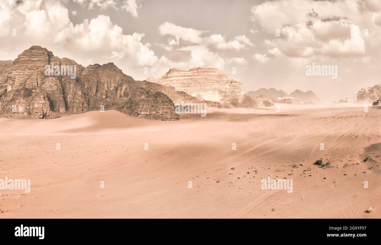 Panorama of the Wadi Rum desert in retro or vintage faded monochrome mood. Beauty in nature. Creative edit Stock Photo - Alamy