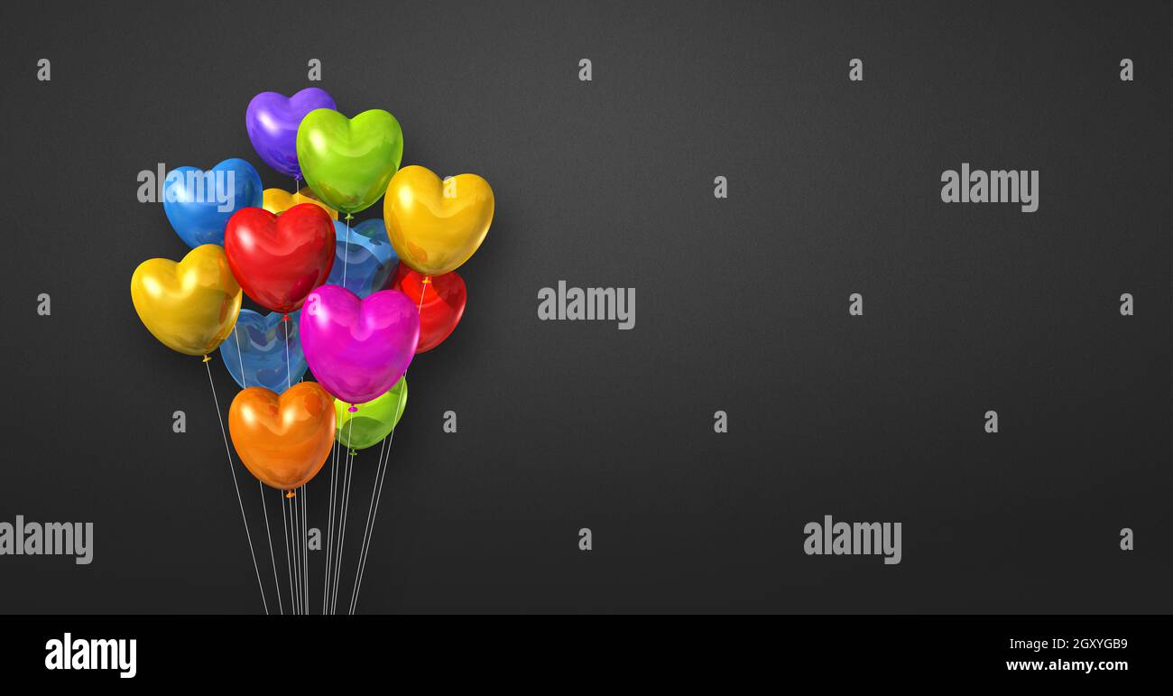 Colorful heart shape balloons bunch on a black wall background ...