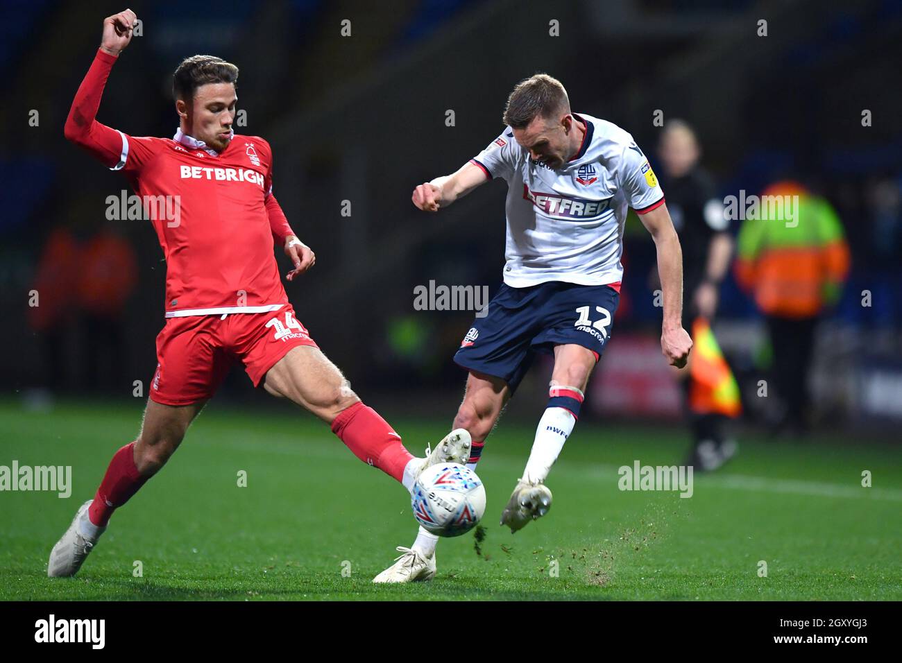 Bolton Wanderers' Craig Noone is tackled by Nottingham Forest's Matty Cash Stock Photo