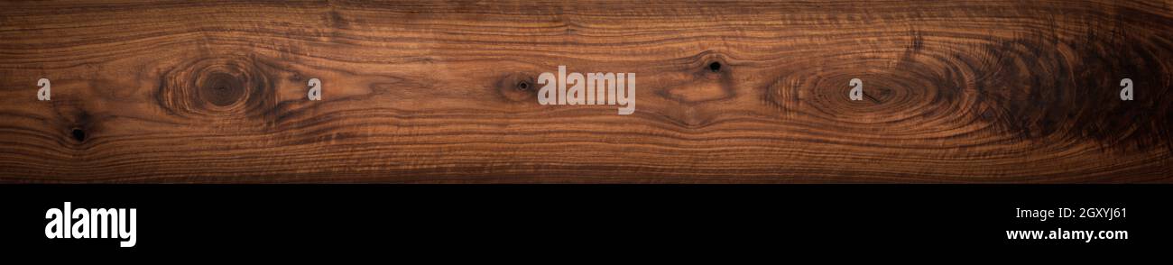 Walnut wood texture. Super long walnut planks texture background.Texture element. Stock Photo