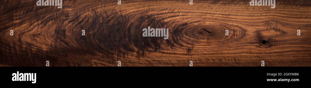 Walnut wood texture. Super long walnut planks texture background.Texture element. Stock Photo