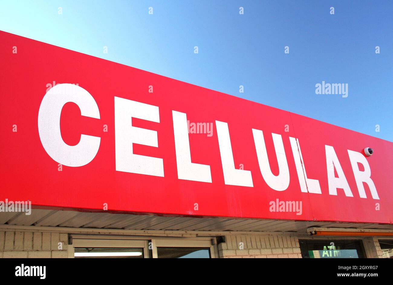 Cellular Sign on Convenience Store Stock Photo - Alamy