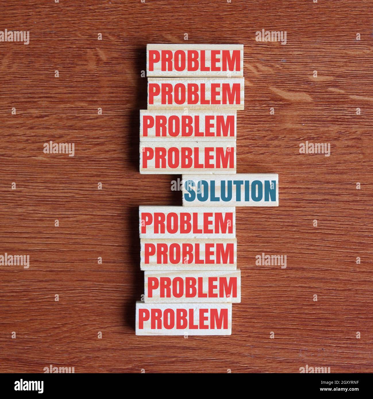 Concept of problem solving. Look for the solution inside the problem. Top view of wooden tiles with text PROBLEM and SOLUTION Stock Photo