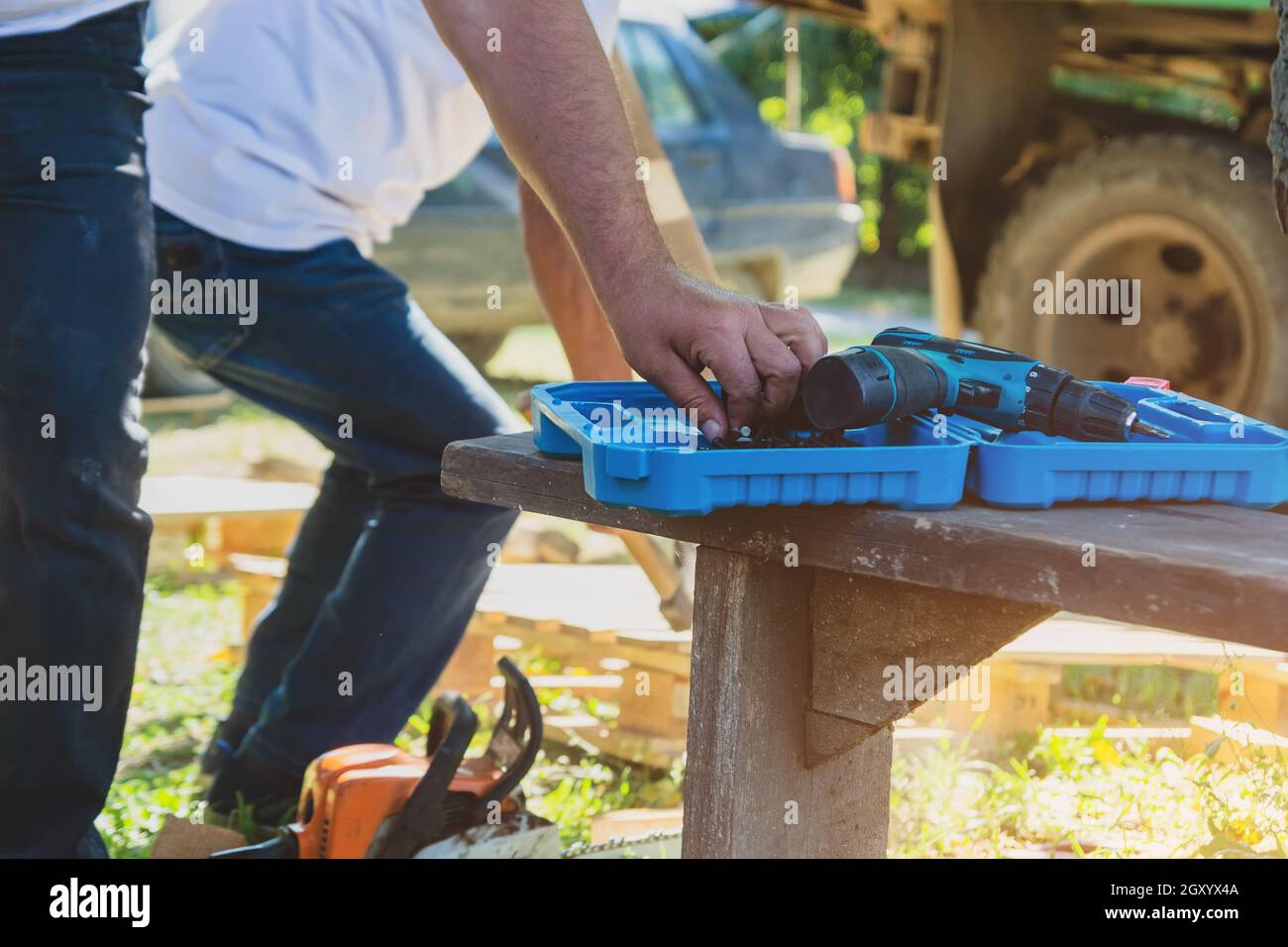 Man uses a screwdriver in work. Stock Photo