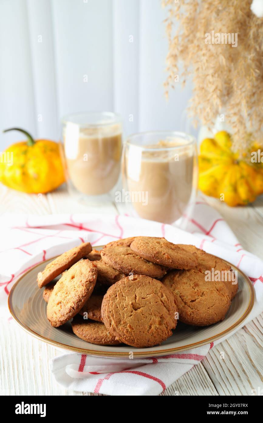 Concept of tasty food with pumpkin cookies. Stock Photo