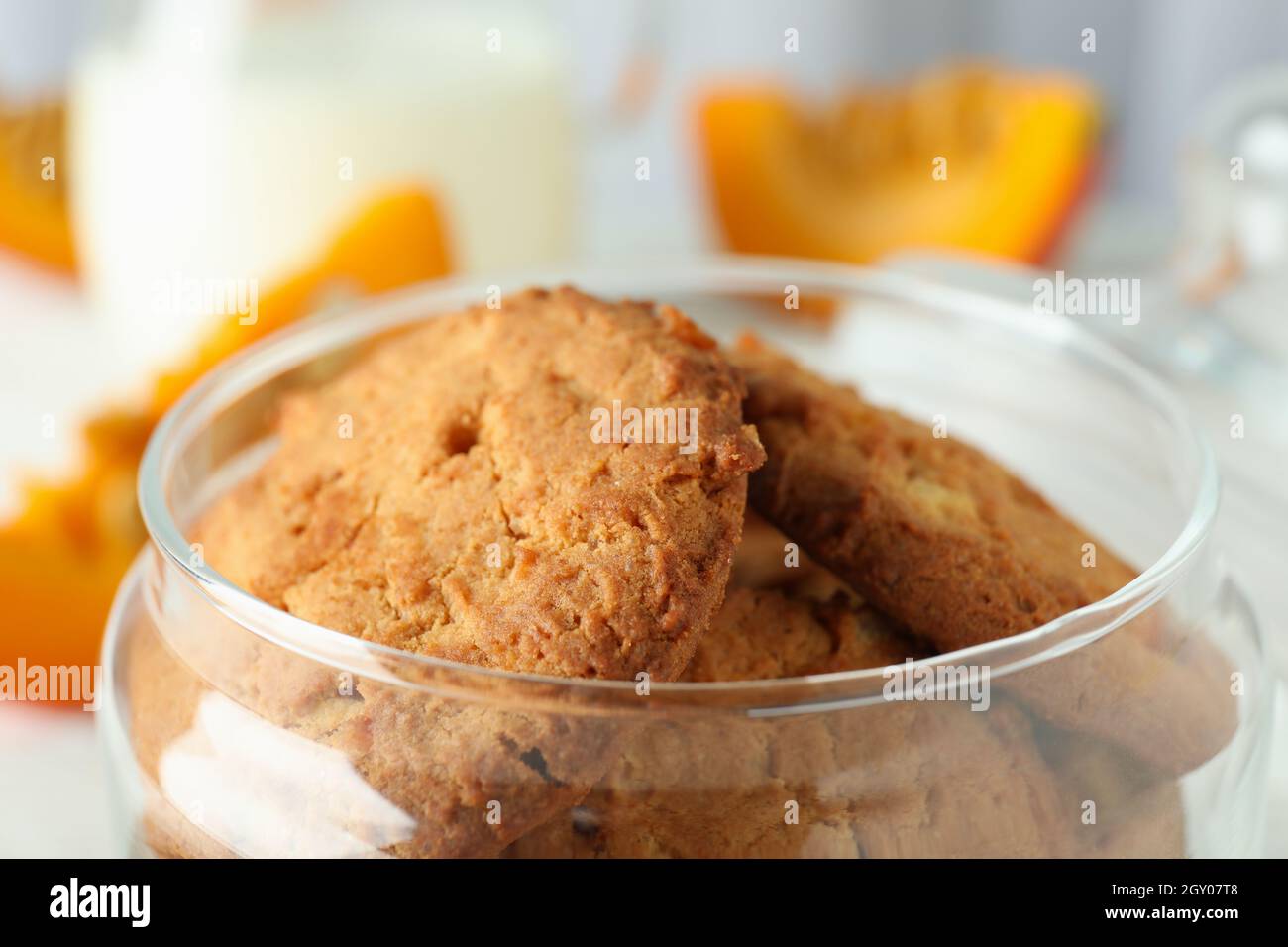 Concept of tasty food with pumpkin cookies, close up. Stock Photo
